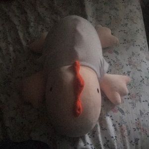 Pink dinosaur weighted